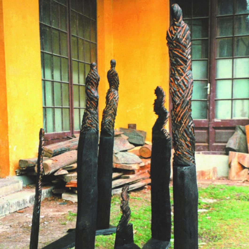 Dragica Čadež, Lignified Shadows I-III, 1998, patina coated burnt wood; a spatial installation in front of the former Švicarija where the artist used to have her studio. Photo, the artist’s archive