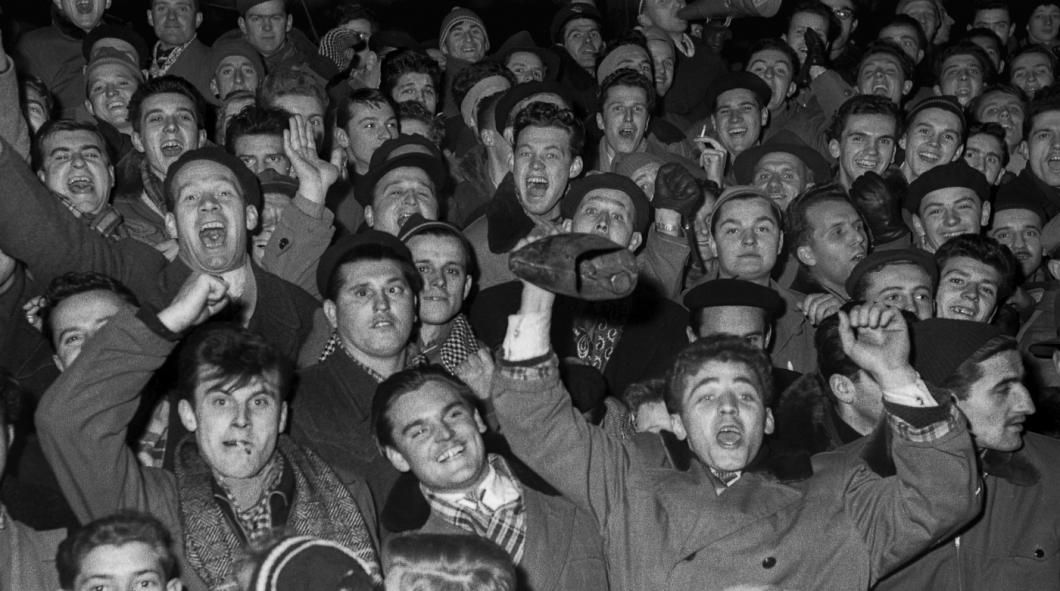 Delighted fans at the hockey match between Ljubljana and Jesenice, which the latter won 2:1, photo: Marjan Ciglič, kept by the National Museum of Contemporary History.