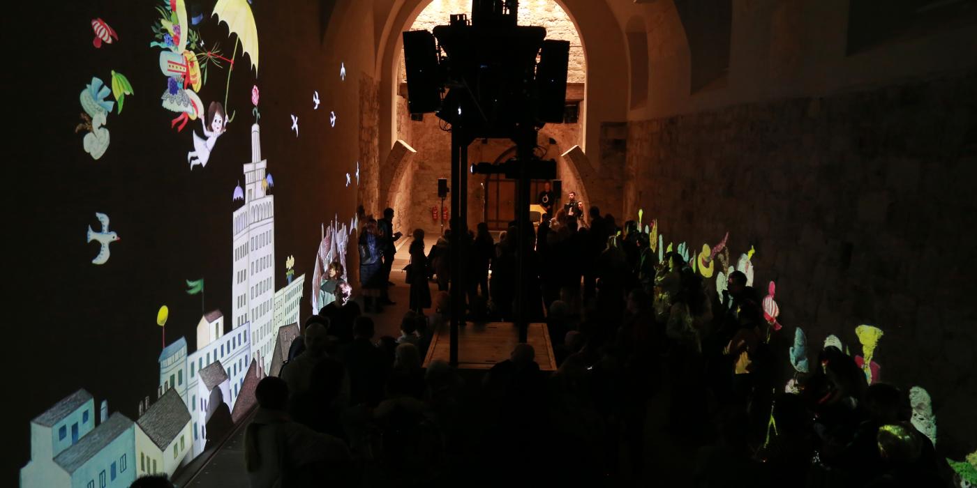 Odprtje prostorske projekcije Ko ilustracije oživijo. Foto: Miha Mally